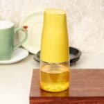 The Earth Store 500 ML Yellow Plastic Oil Dispenser